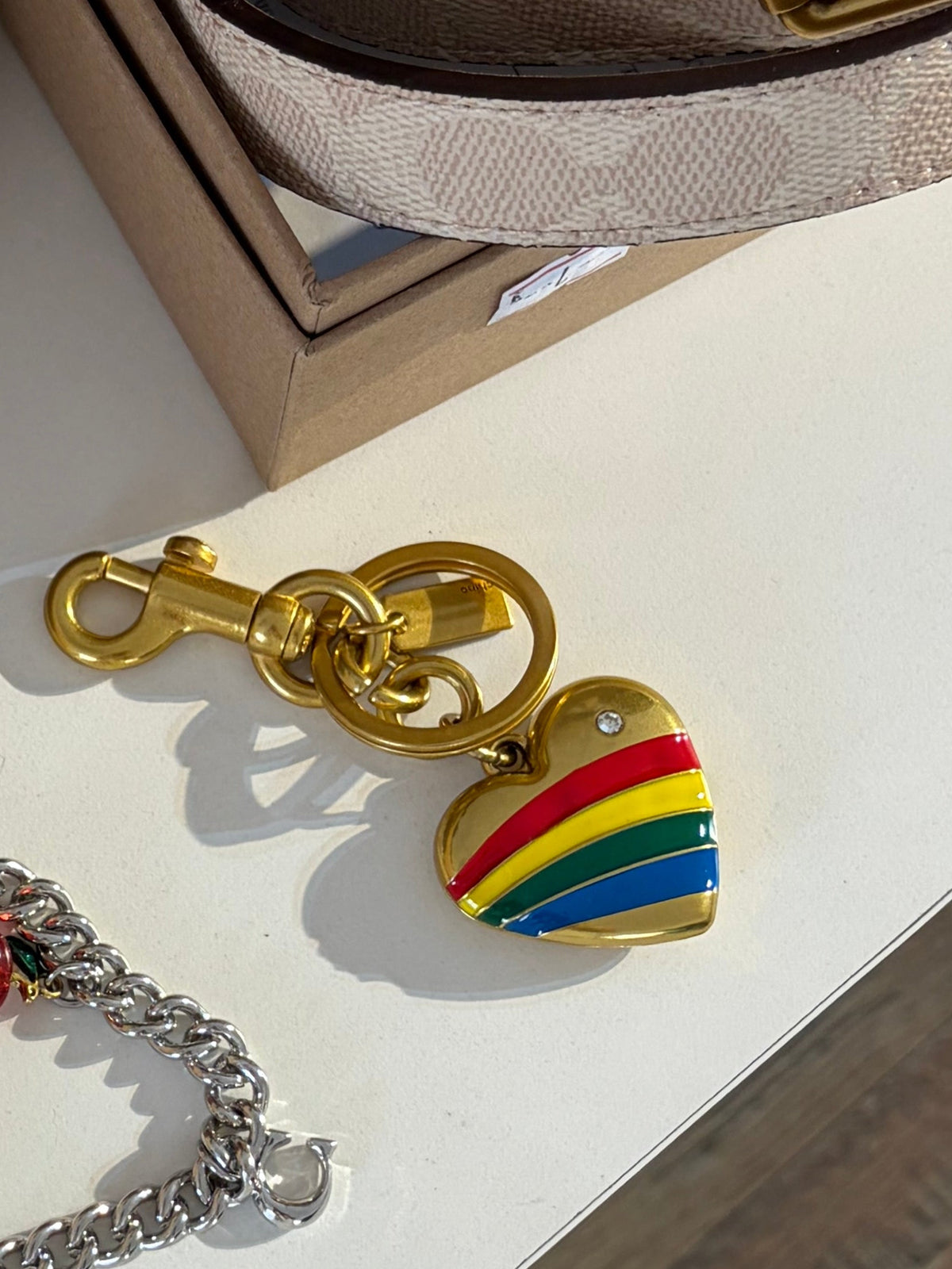 Coach heart charm
